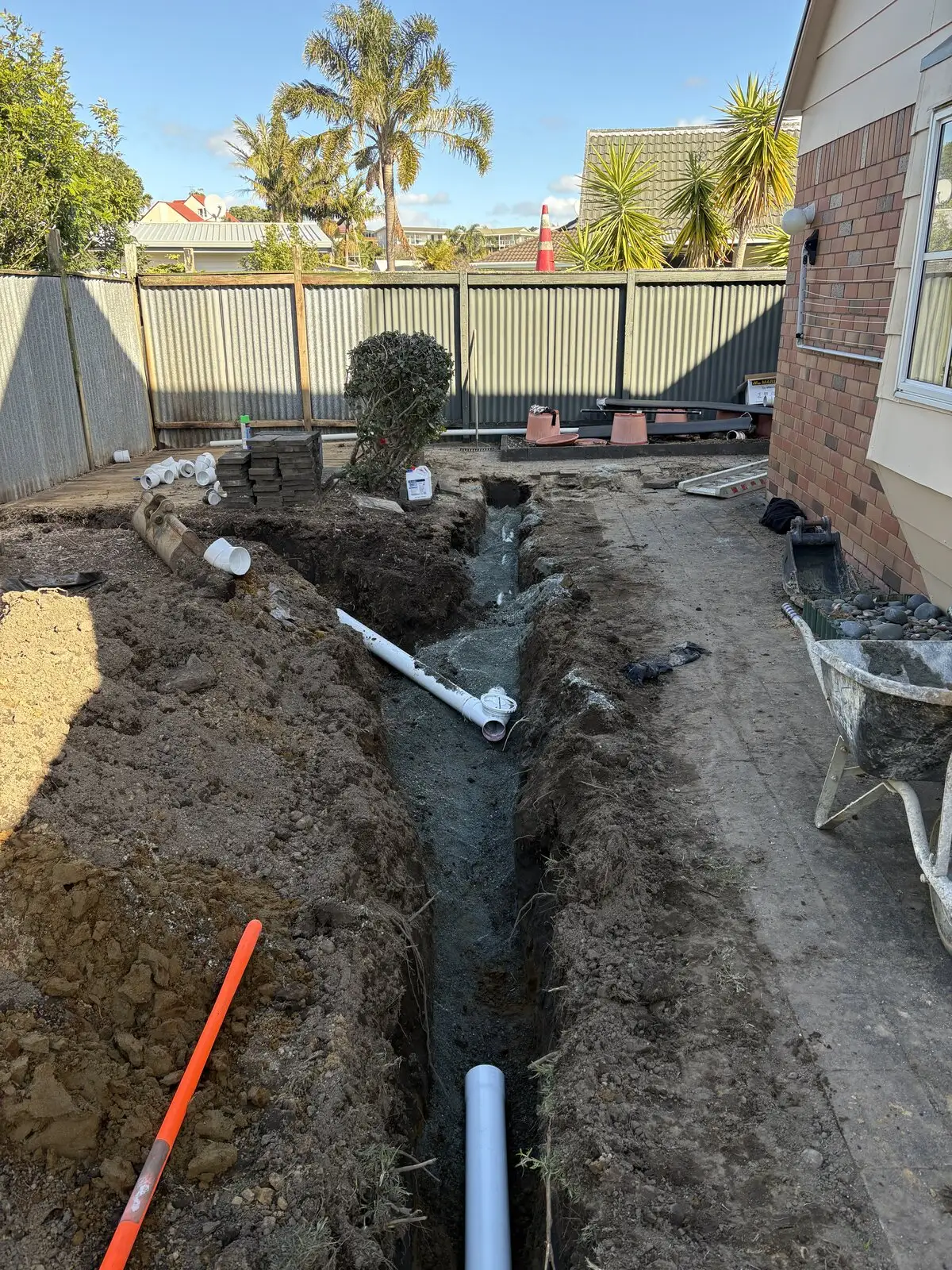 Failed drain dug out and relaid in new PVC in an open trench