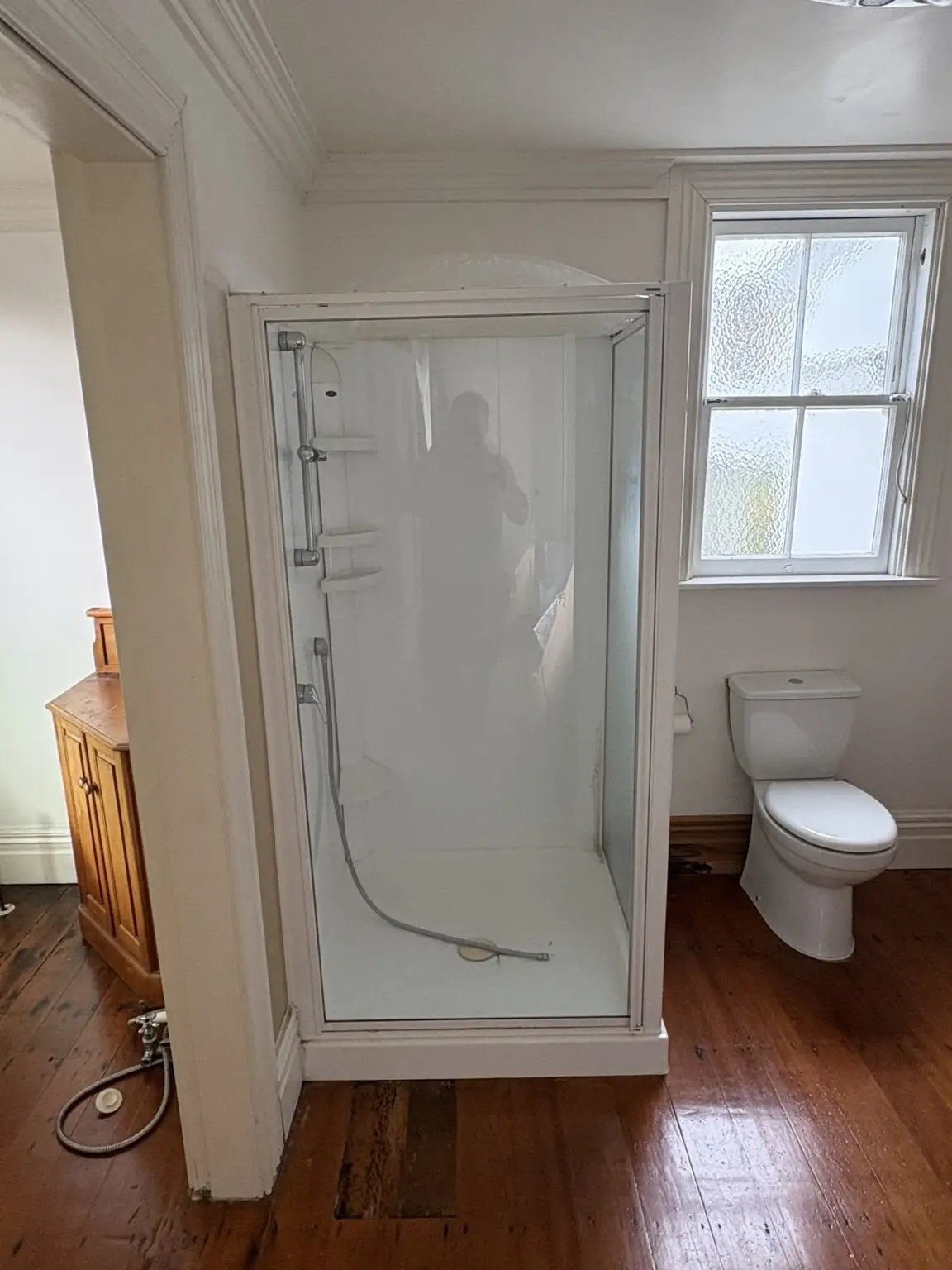 Before: old shower cubicle
