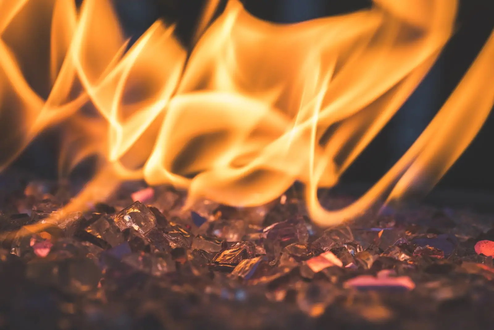 Close-up of flames over the coals of a gas fire