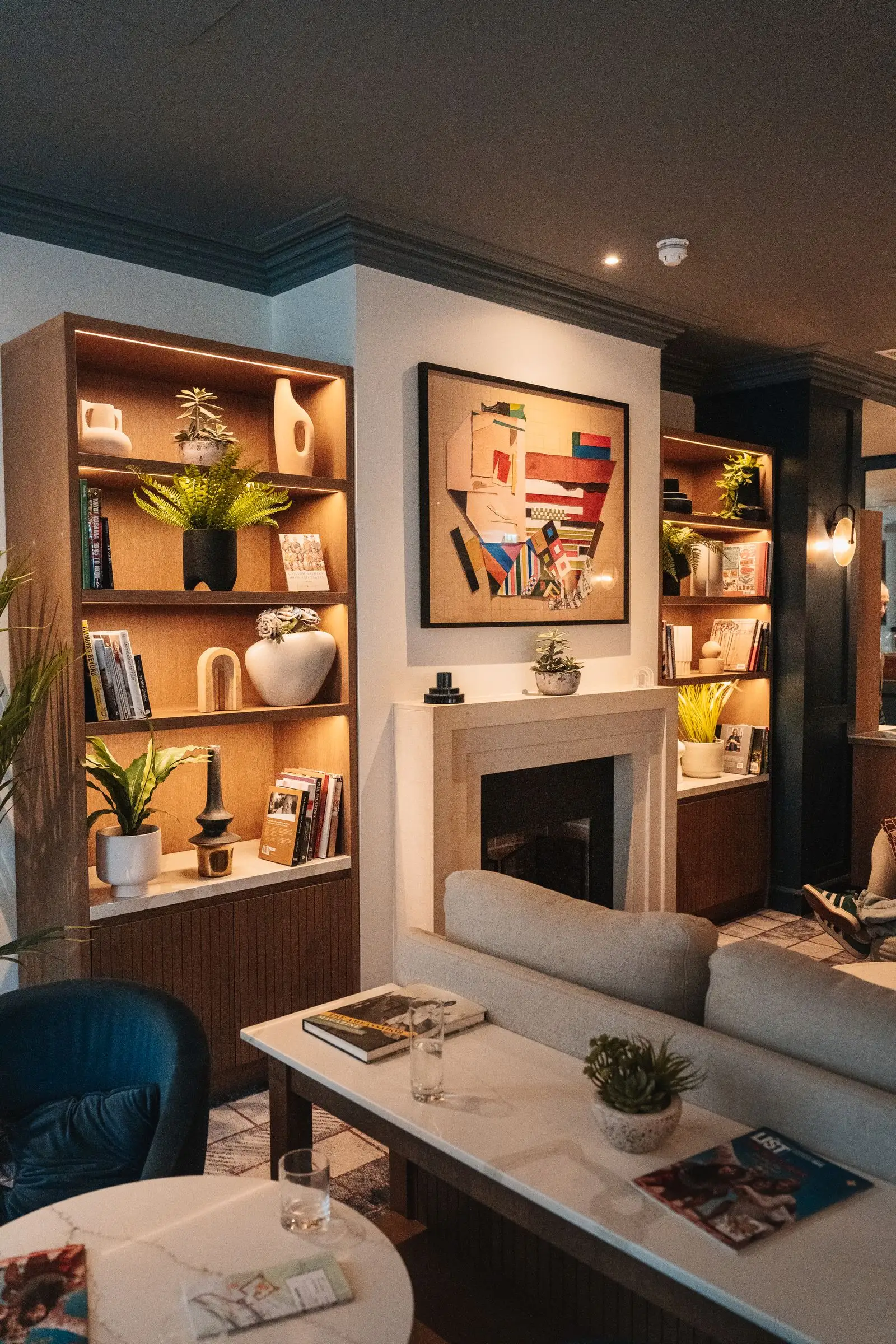 Gas fireplace burning in a living room wall