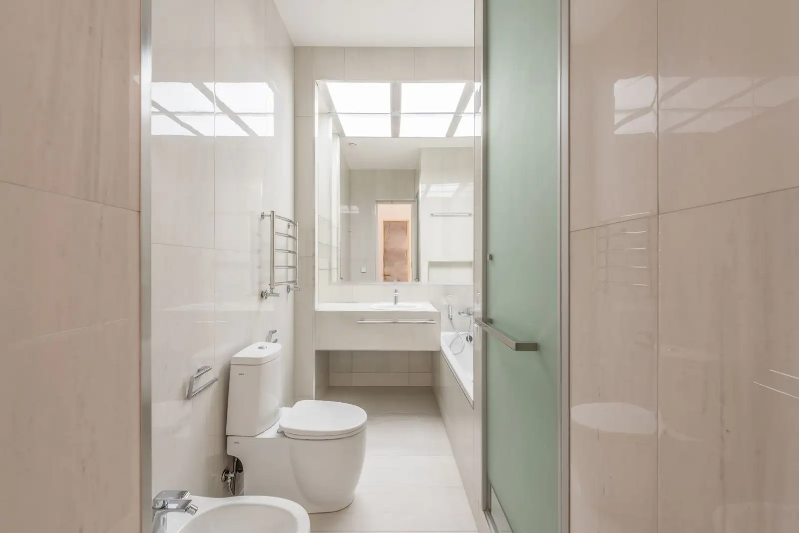 Clean white toilet in a simple modern bathroom